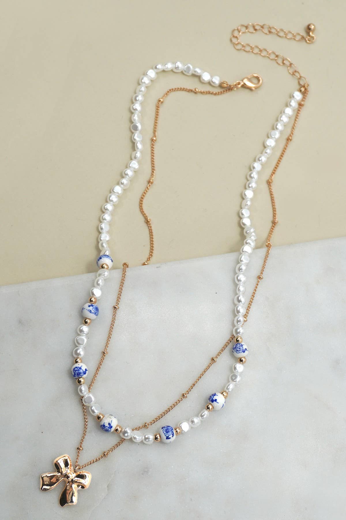 CERAMIC PORCELAIN PEARL BOW LAYER NECKLACE